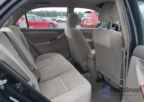 2003 Toyota Corolla Le z USA, uszkodzony, nr VIN JTDBR32E130022943